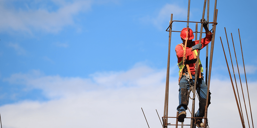 construction worker on ladder
